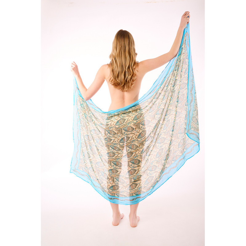 This light and airy sarong sized at 180cm by 100cm is the ultimate elegant  cover up. Made of fine voile weaved cotton, it bares